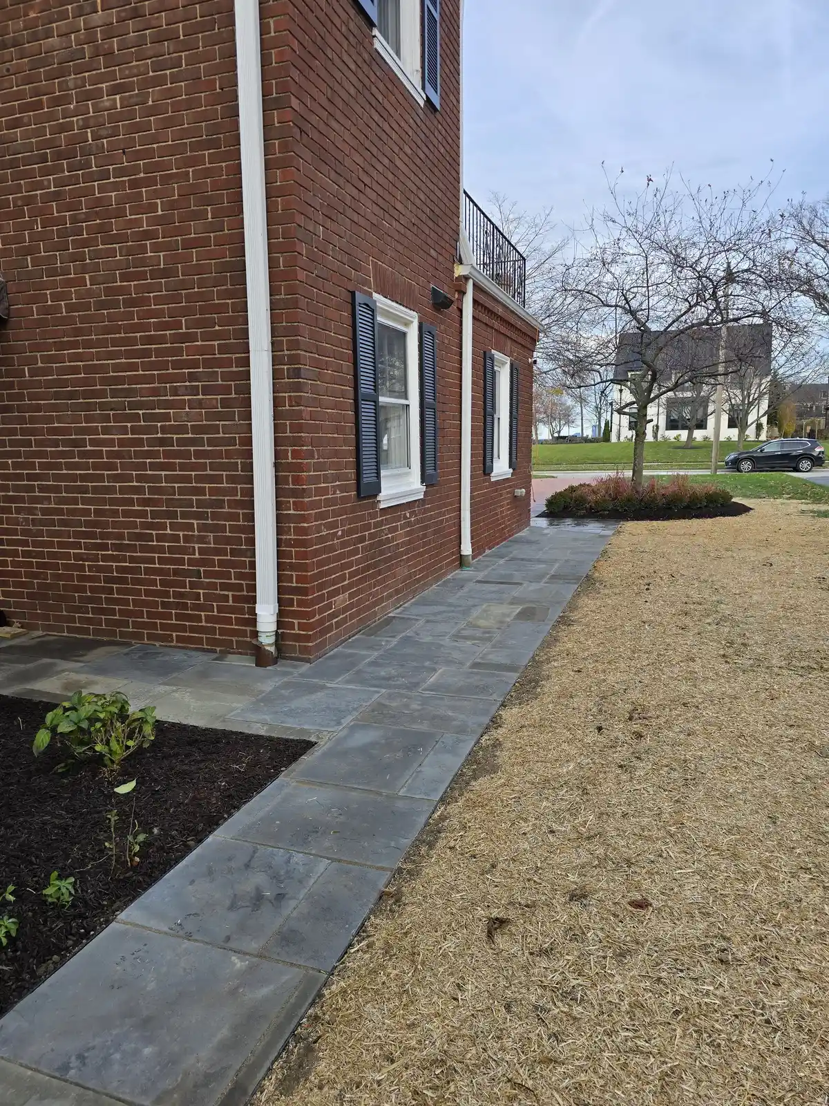 Patio hardscape with stonework and defined outdoor seating area