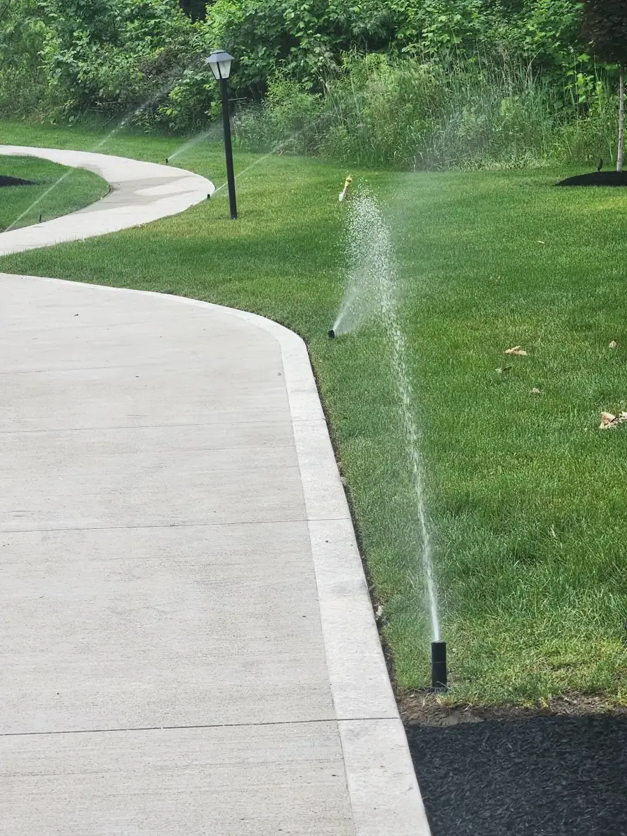 Sprinkler system installation in residential yard