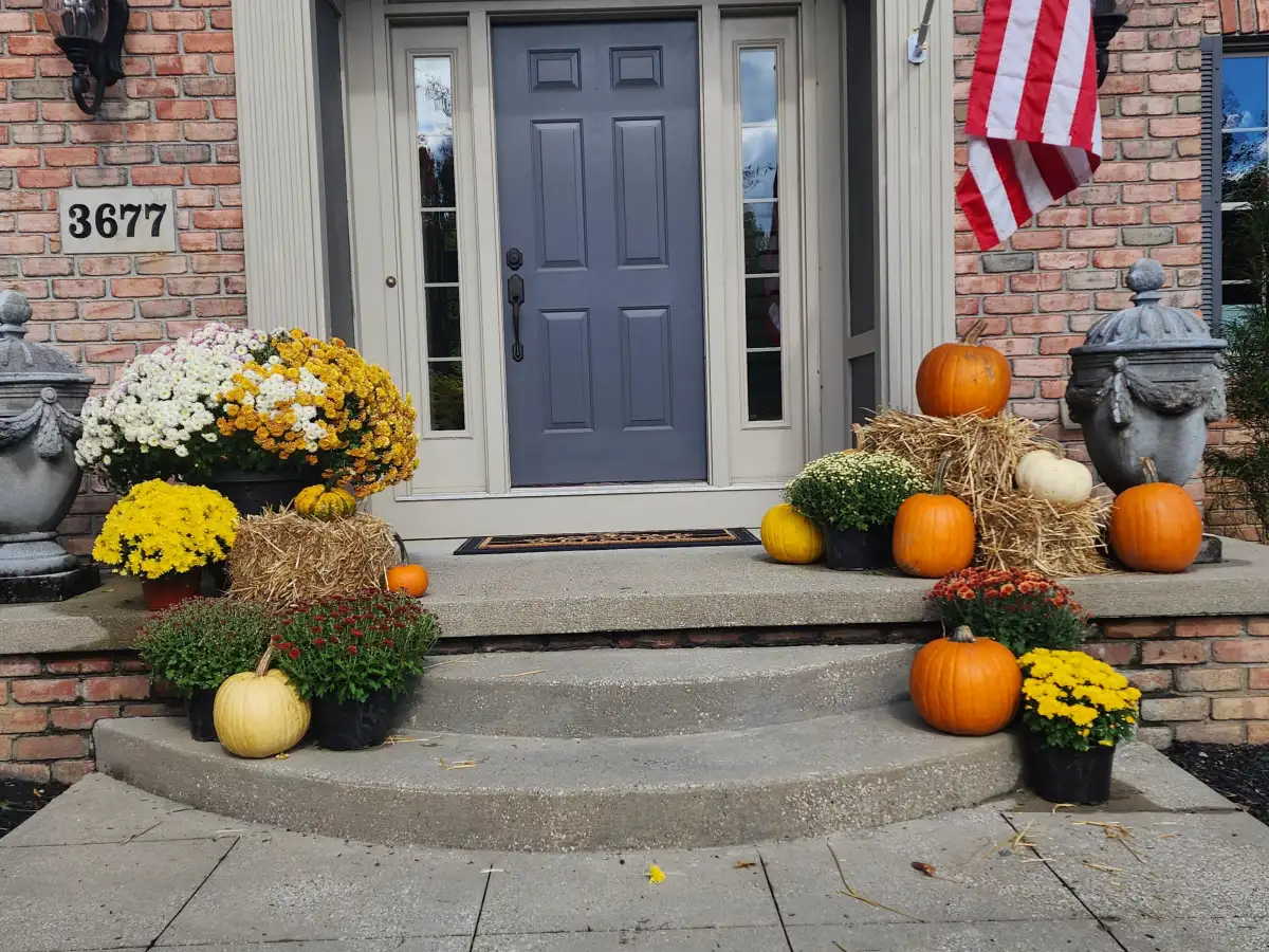 Clean commercial landscape entry with maintained beds