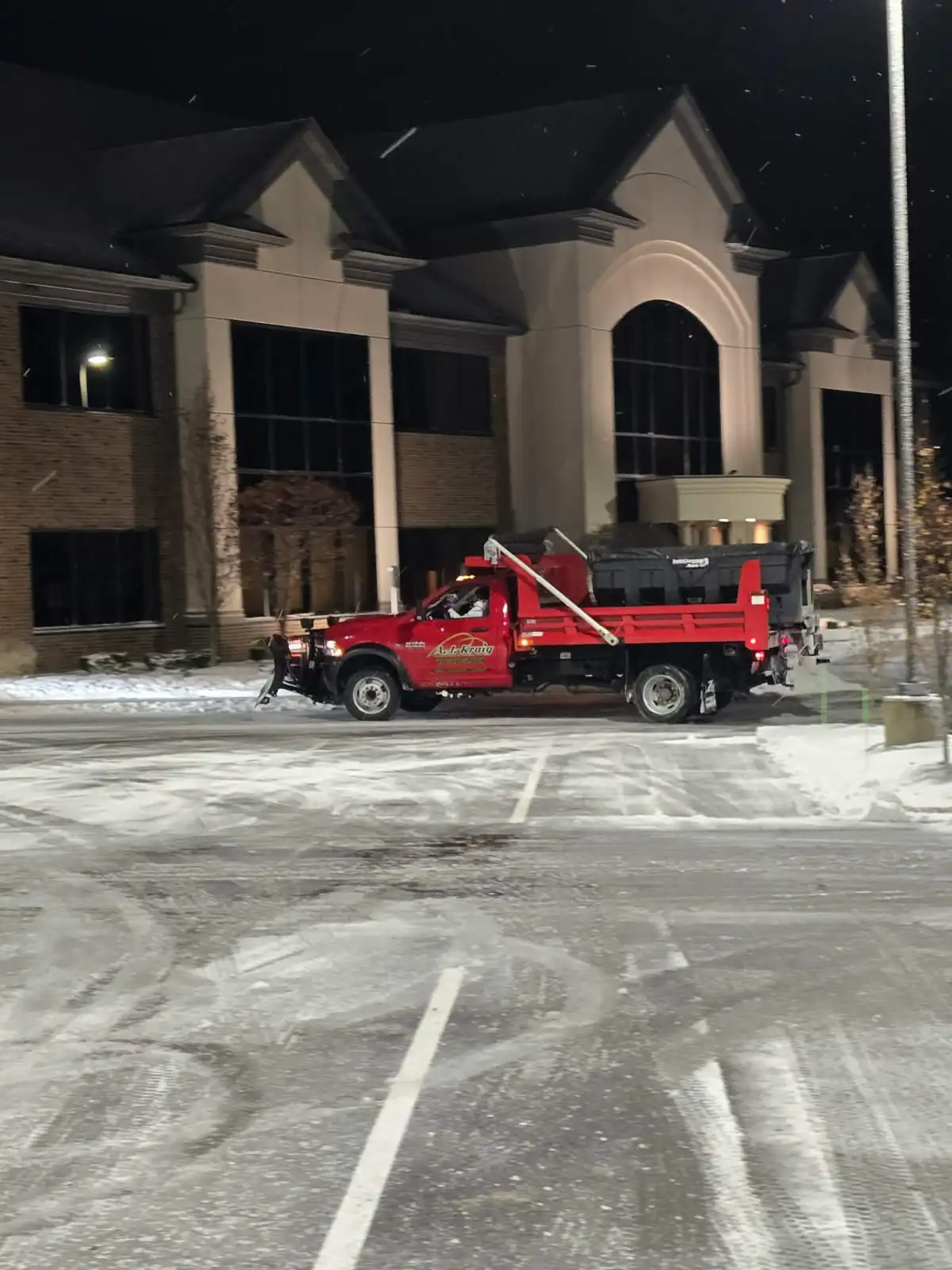 Residential driveway clearing after snowstorm