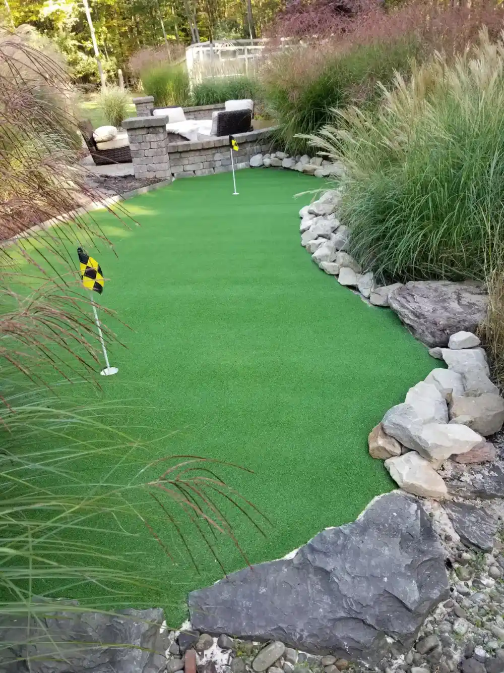 Custom backyard putting green installed by A.J. Kraig