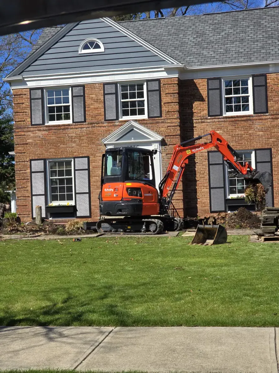 Andrew Kraig and the A.J. Kraig landscaping crew on a job site