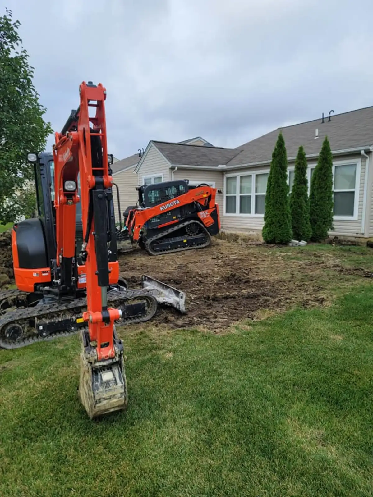 A.J. Kraig crew members on a landscaping job in Northeast Ohio